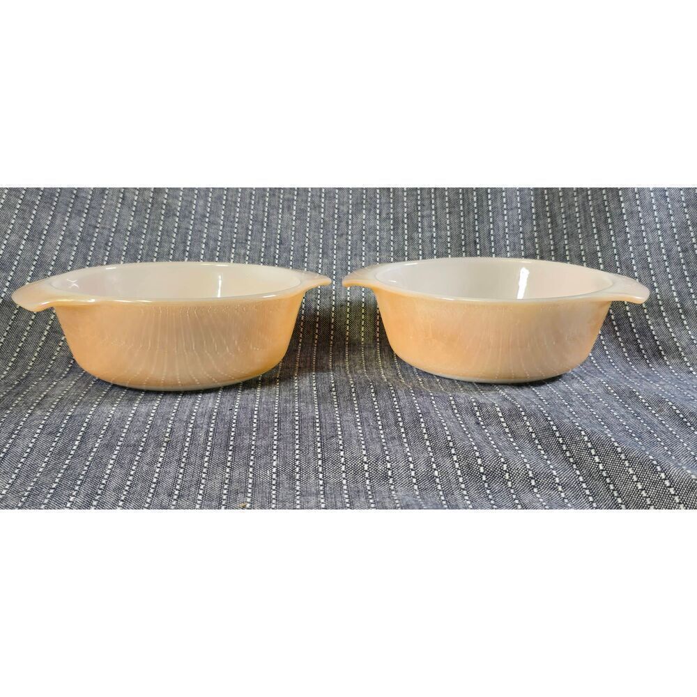 Two Fire-King Peach Luster casserole Model 472